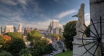 Roger Williams statue in Prospect Park, overlooking the Providence skyline